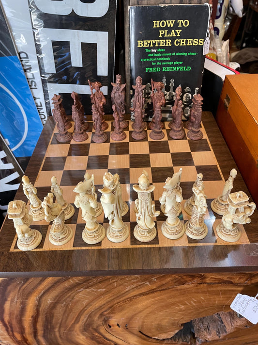 Vintage Chess Set w/ Board and Carrying case. 2 chess pieces need bottoms fixed but intacted .