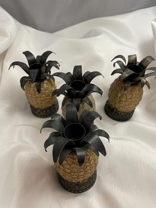 Vintage set of 4 Pier One color Pineapple candle holders. 60 for the set.