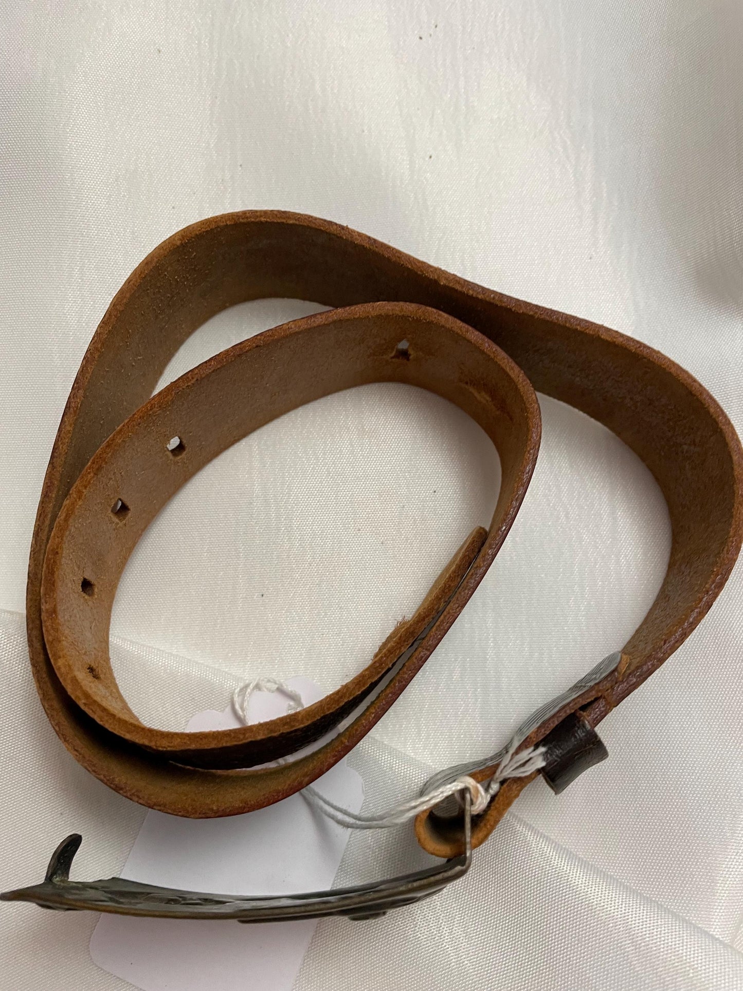 Old Vintage 1950’s small Leather Cowboy Belt w/ Buckle. Great pressed Back on buckle.