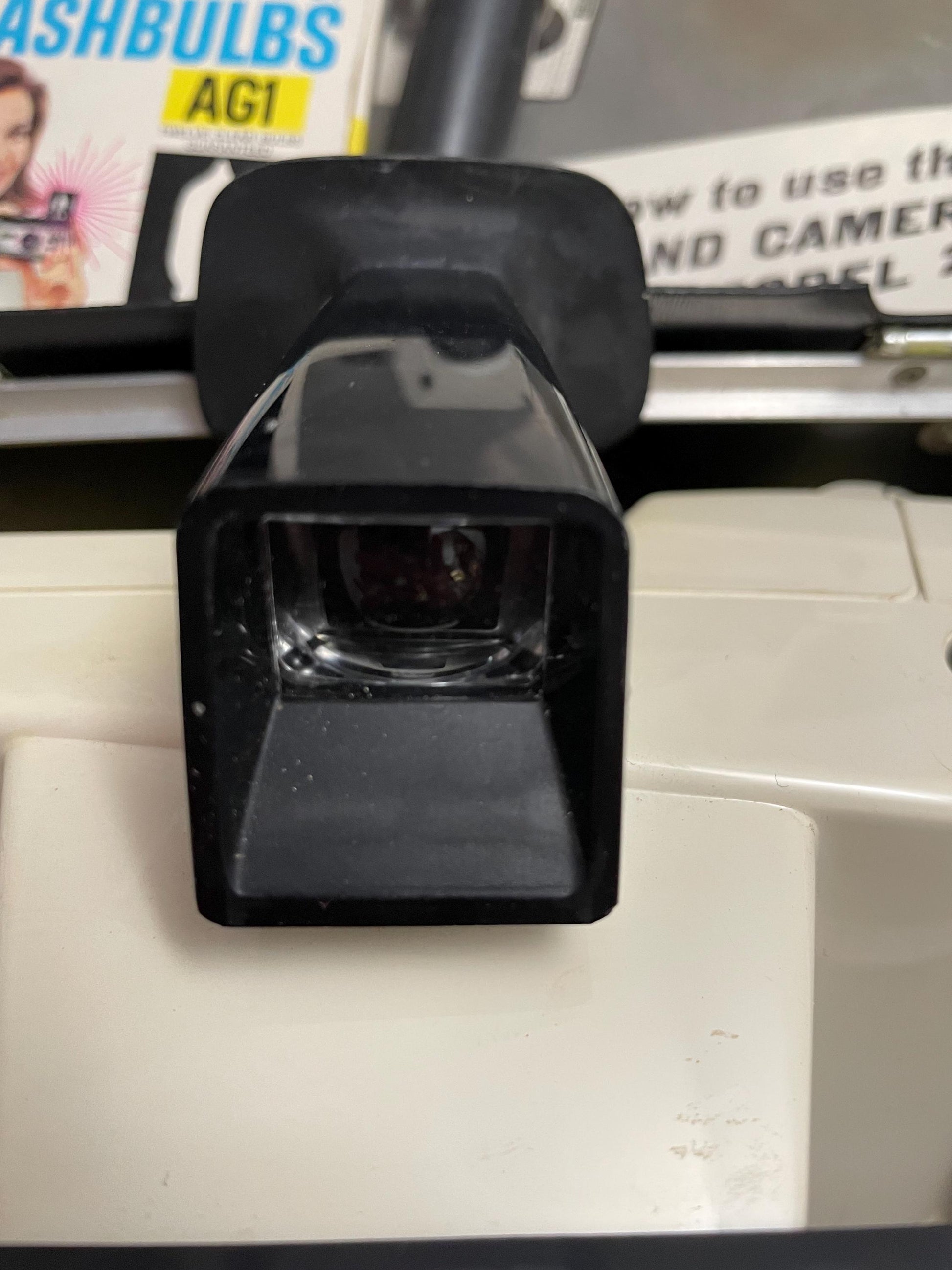 Vintage Polaroid Swinger model 20 Land camera w/ case, instructions and extra flashbulbs.