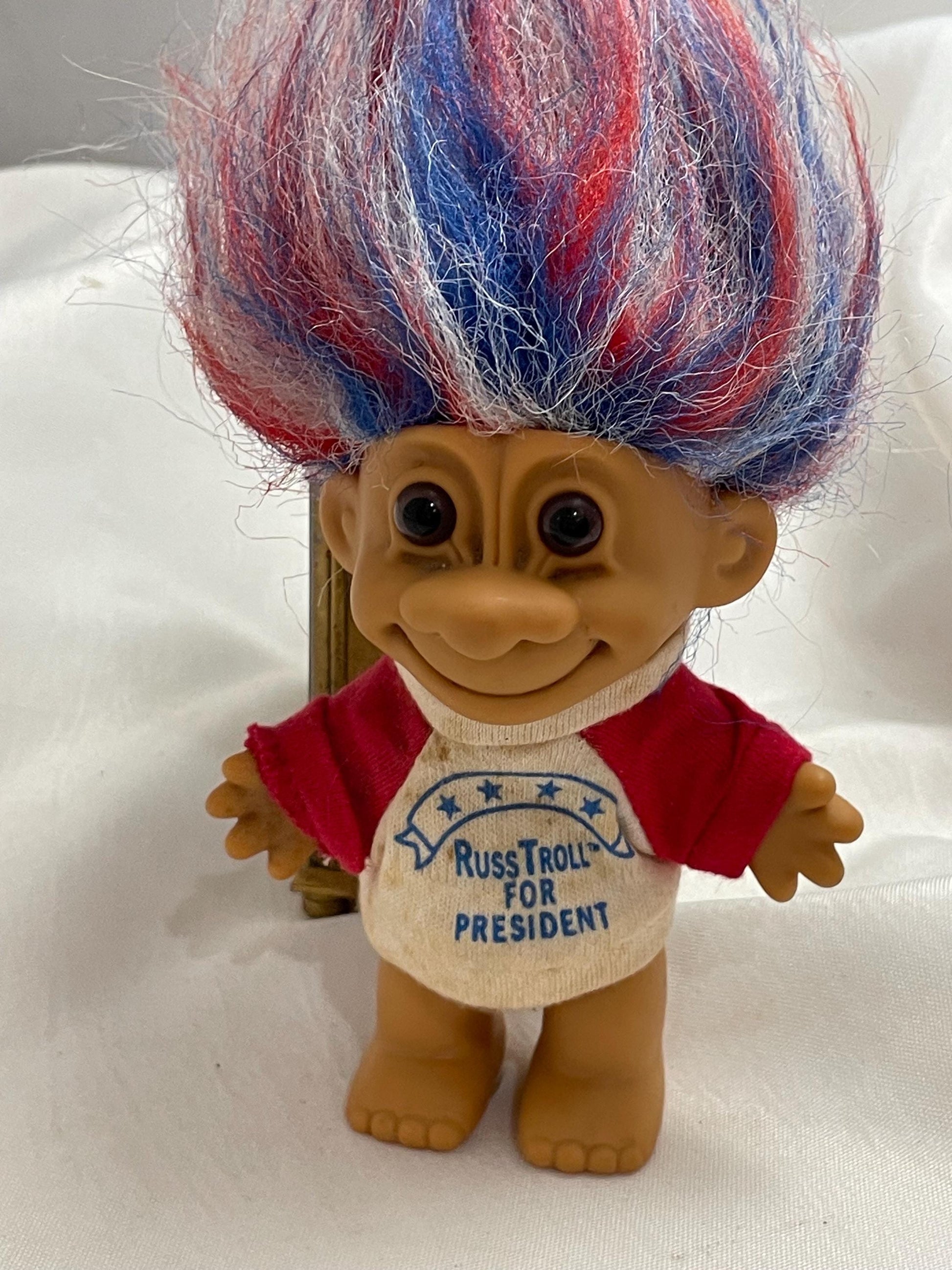 Vintage 1980’s Russ Troll For President doll. shirt is removable and washable. 41/2”. Red/ White and Blue hair.