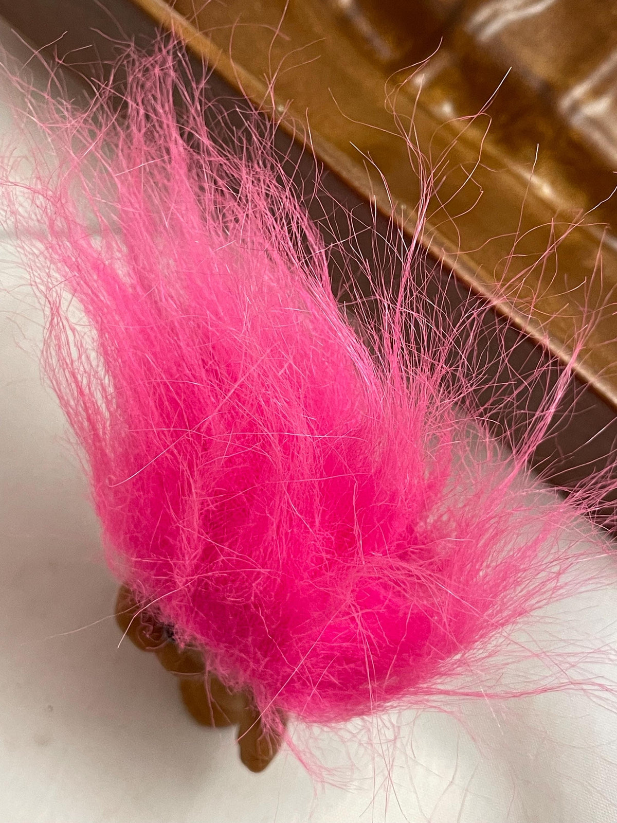 Vintage Russ Pink hair Troll doll. 3 1/2 “.