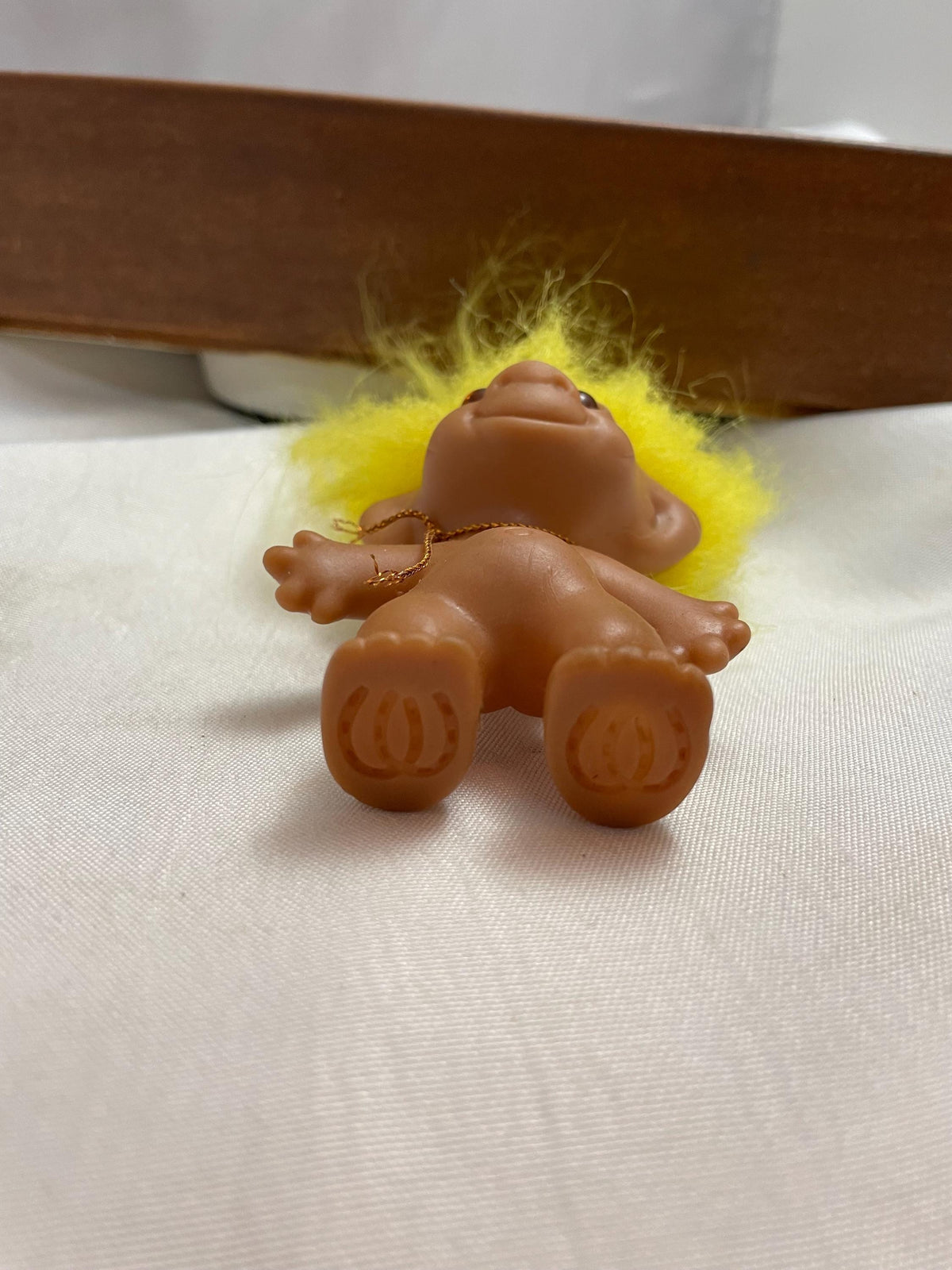 Vintage Russ Troll doll w/ Yellow hair. 3 1/2”.