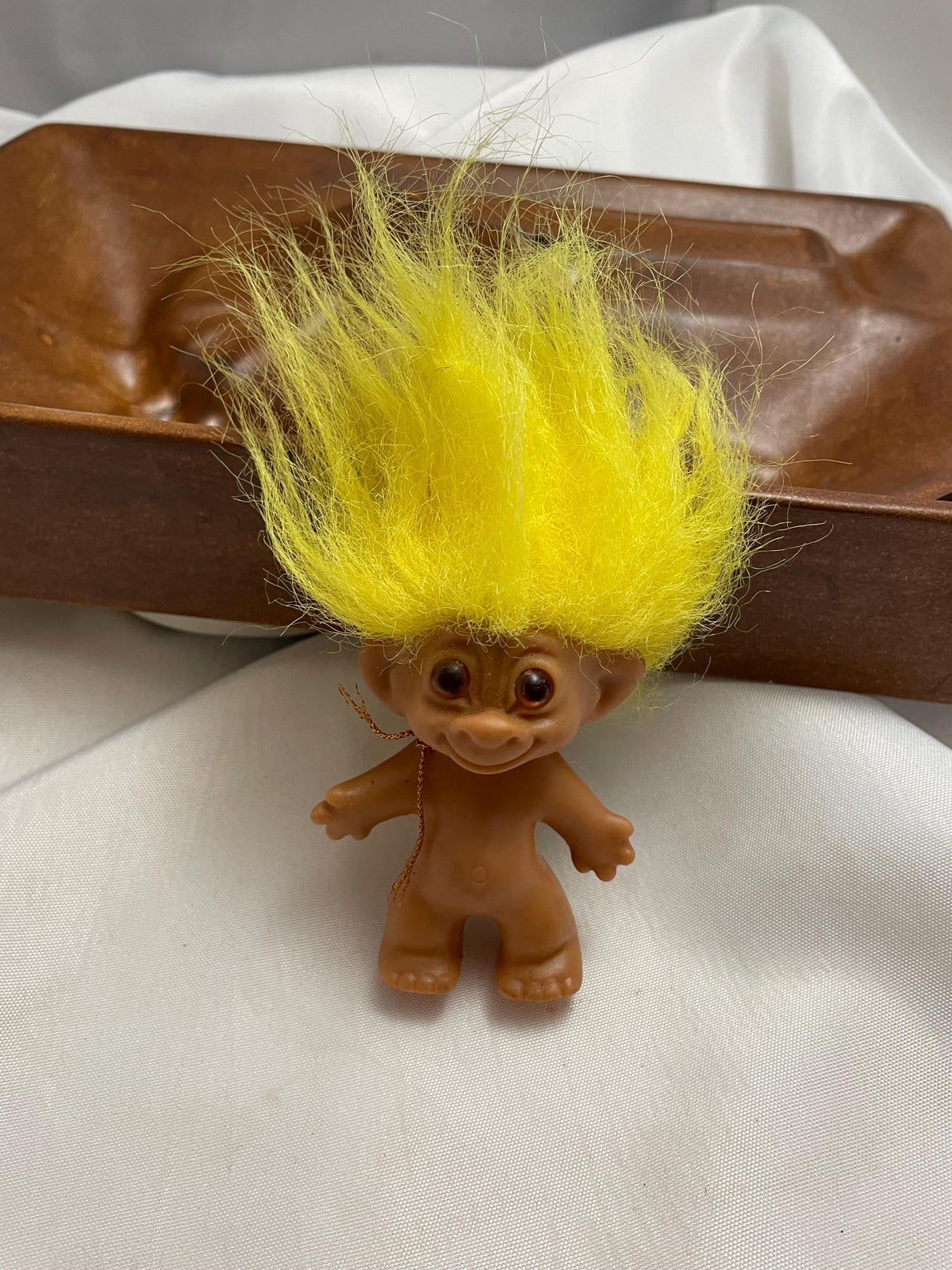 Vintage Russ Troll doll w/ Yellow hair. 3 1/2”.