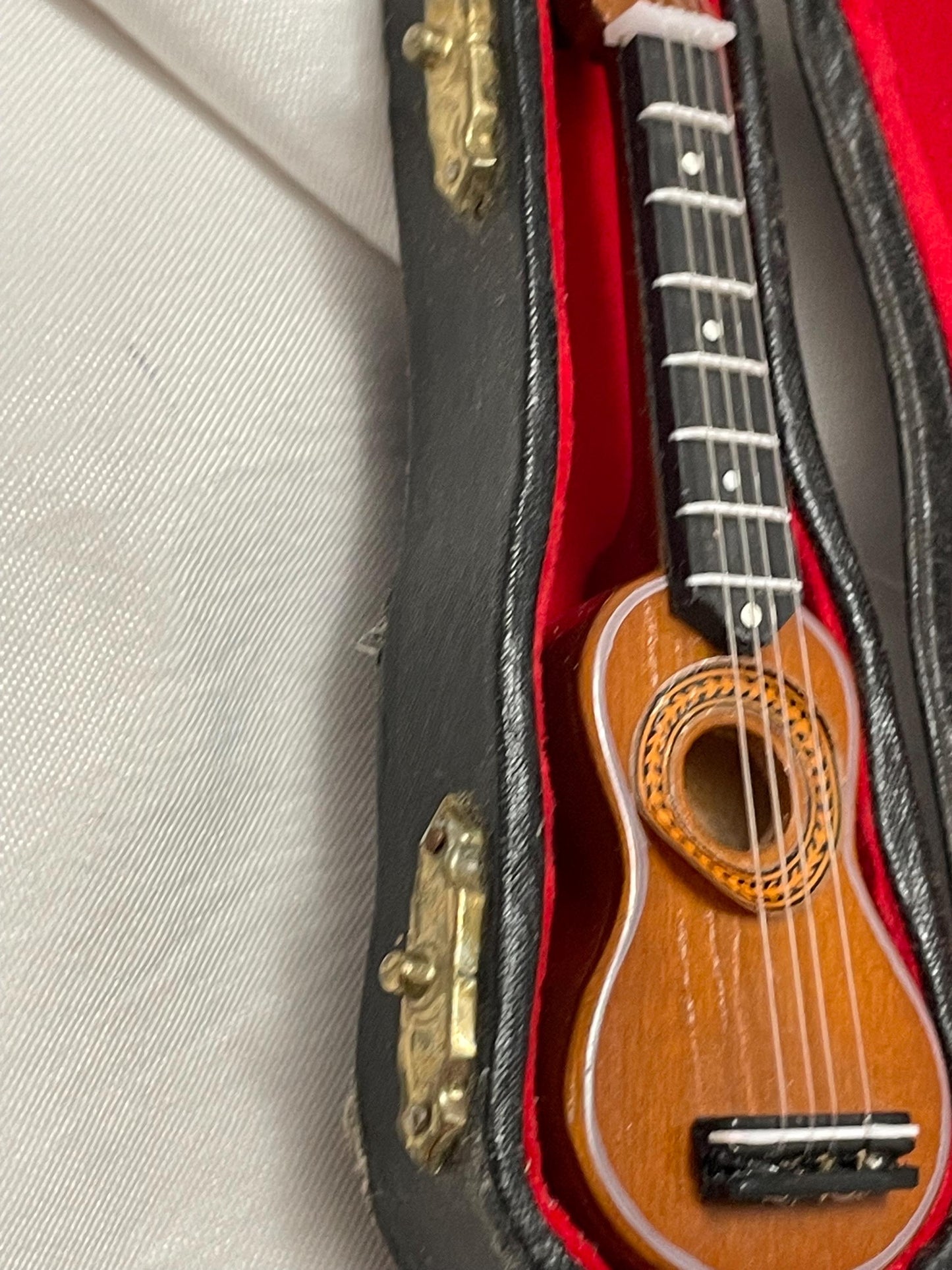 Miniature Replica of Acoustic Guitar in case.