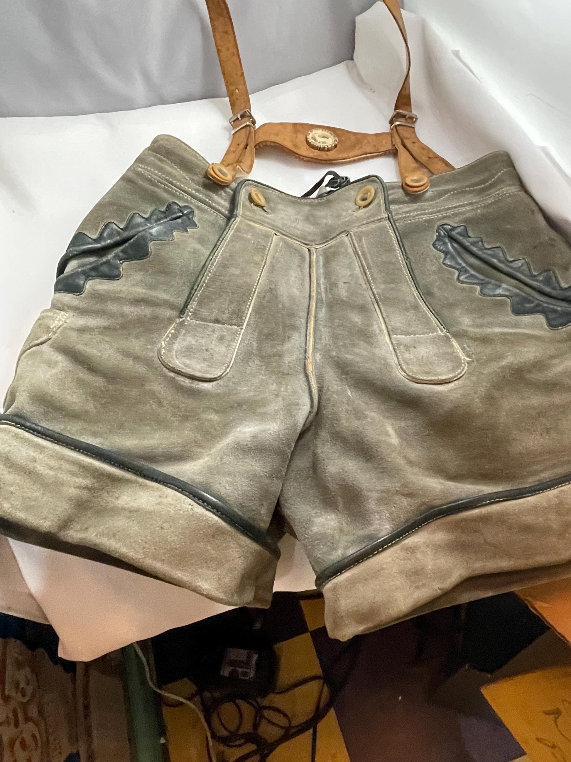 Vintage suede Lederhosen suspender shorts w/ 50’s-60’s Vintage Lederhosen Leather pants brace w/ zipper pocket and Deer Emblem.