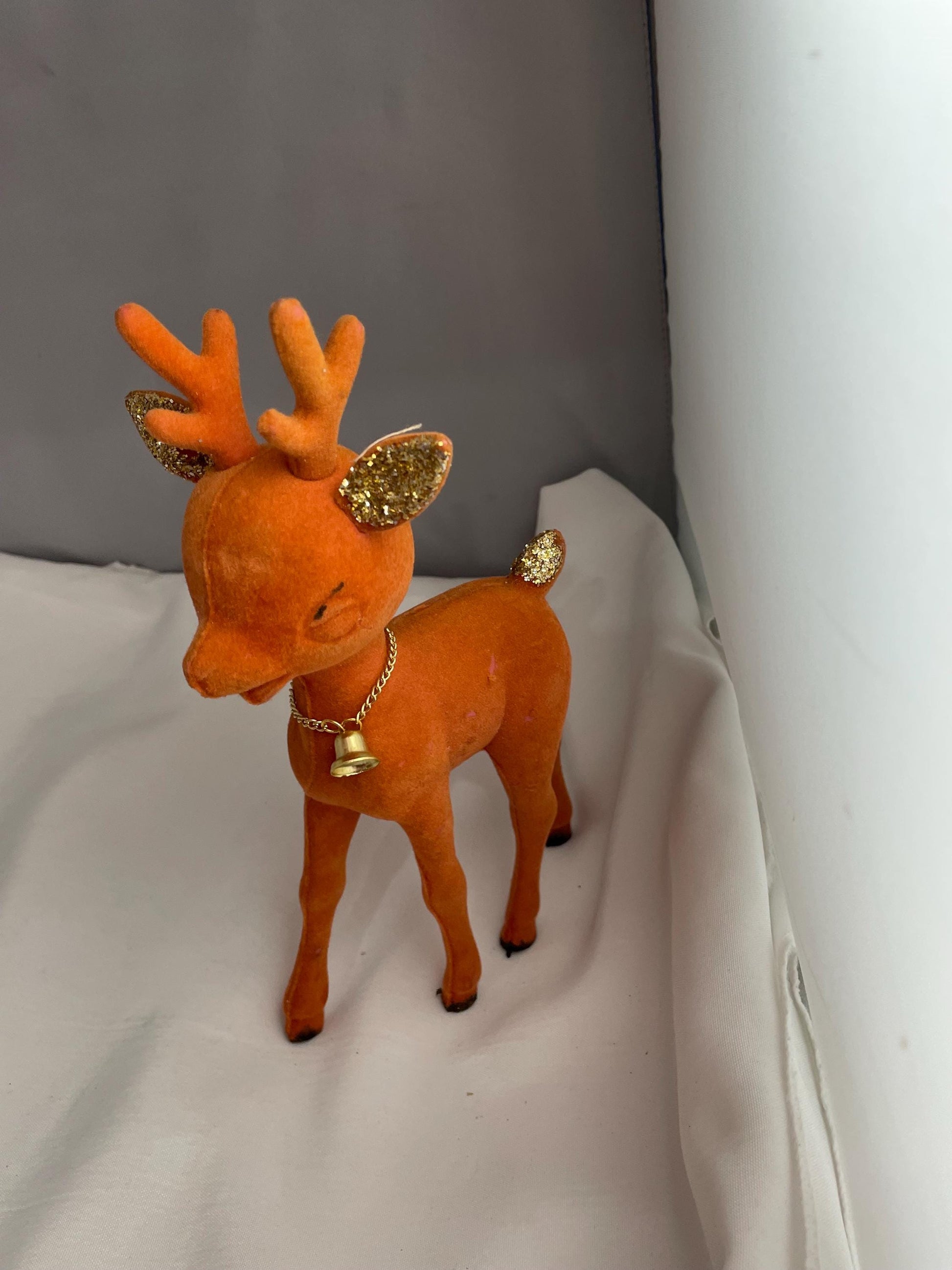 Vintage Flocked Plastic Rudolph Christmas decor.