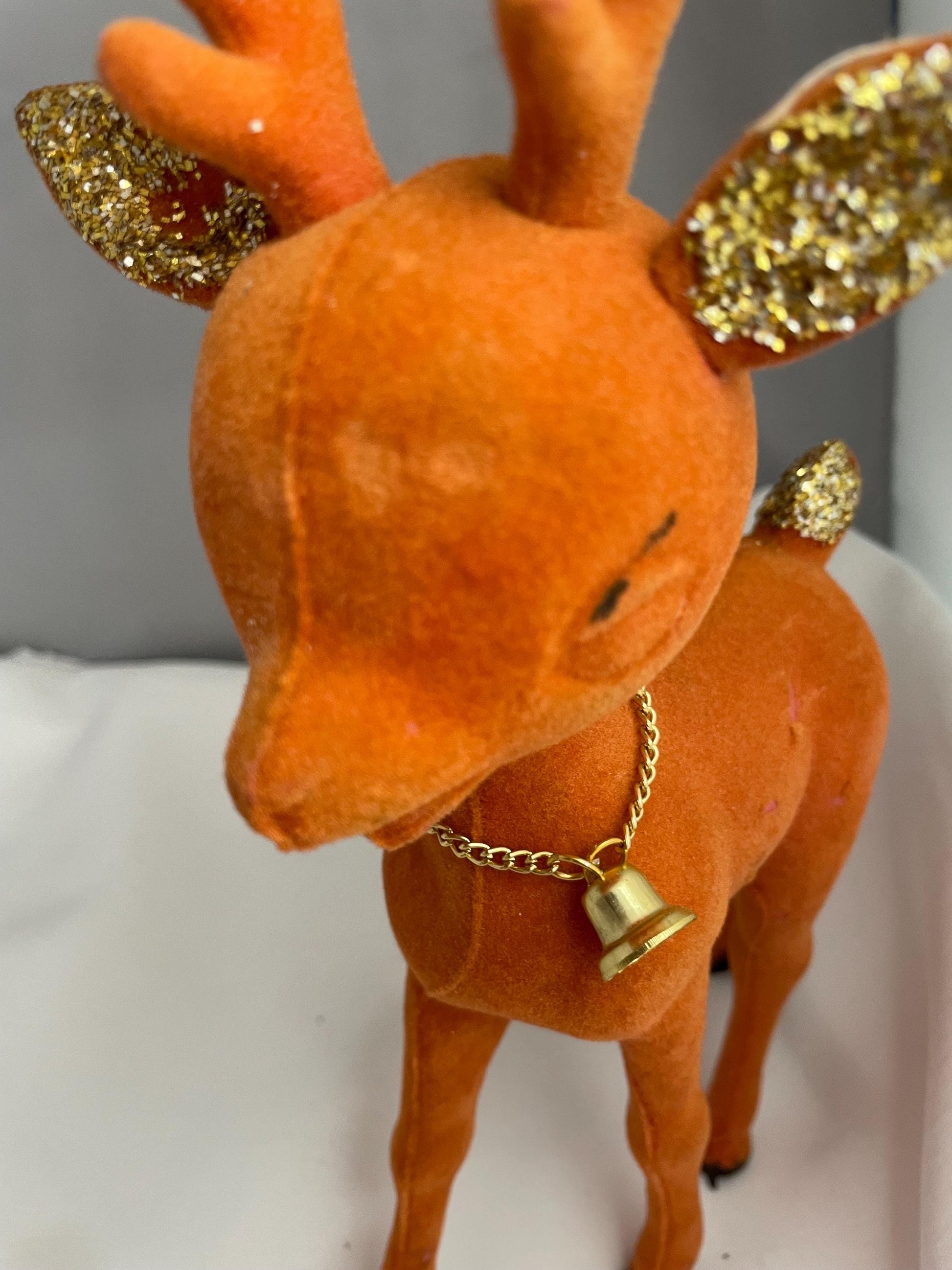 Vintage Flocked Plastic Rudolph Christmas decor.