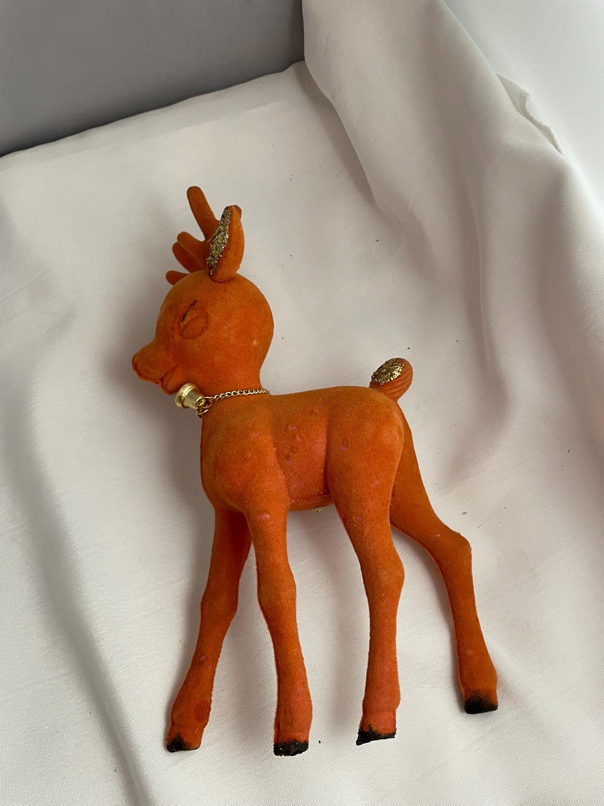 Vintage Flocked Plastic Rudolph Christmas decor.