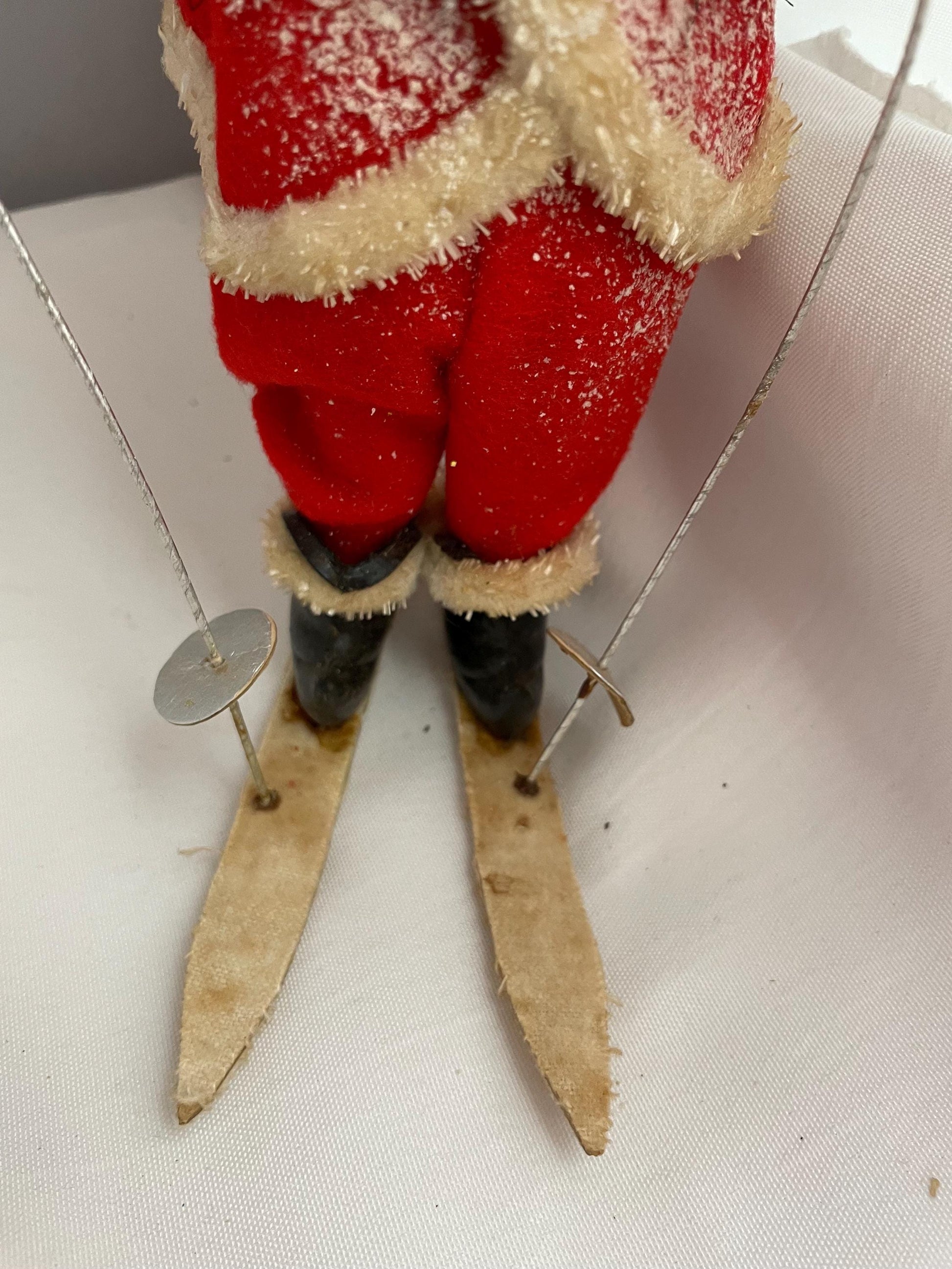 Vintage Christmas Santa Claus Skiing collectible decor.