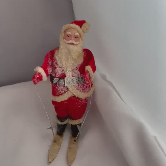 Vintage Christmas Santa Claus Skiing collectible decor.