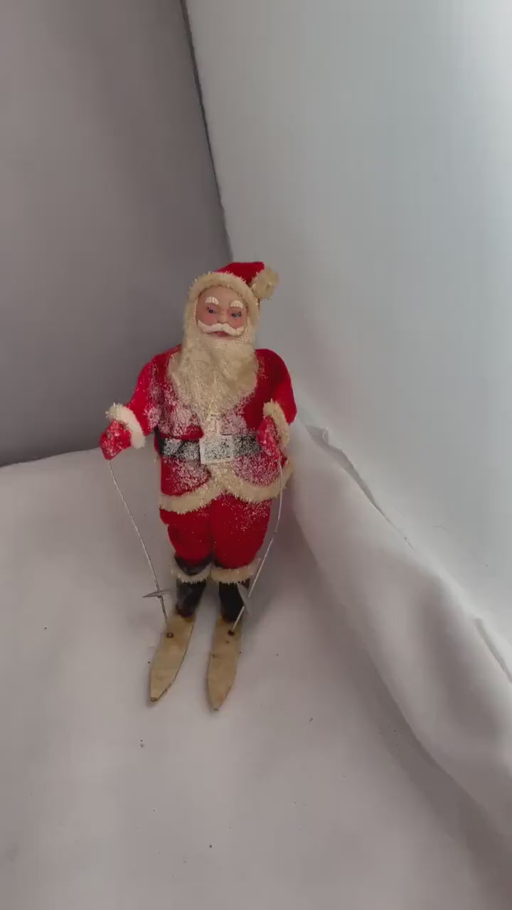 Vintage Christmas Santa Claus Skiing collectible decor.