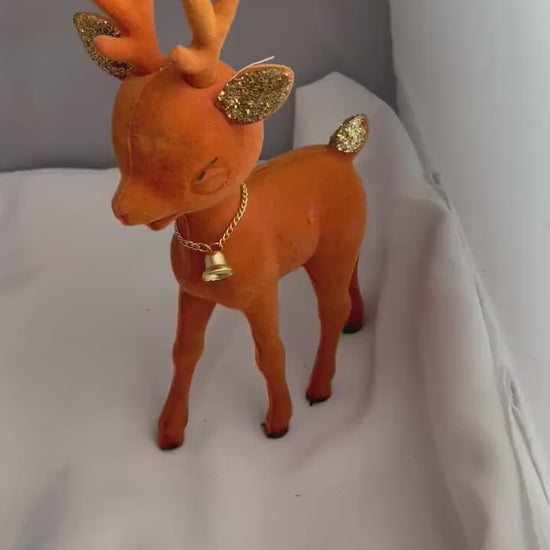 Vintage Flocked Plastic Rudolph Christmas decor.